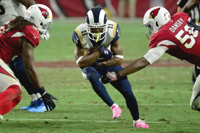 Dec 3, 2017; Glendale, AZ, USA; Los Angeles Rams wide receiver Tavon Austin (11) runs the ball as Arizona Cardinals linebacker Chandler Jones (55) defends during the second half at University of Phoenix Stadium.